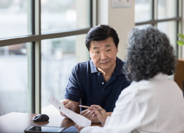 Asian male patient with female dr